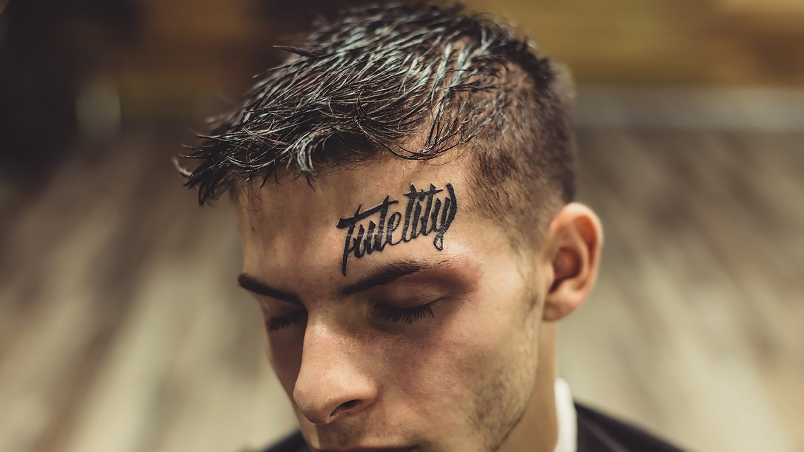 portrait-of-man-with-tattoo-PJPNNRD-2-1600x900